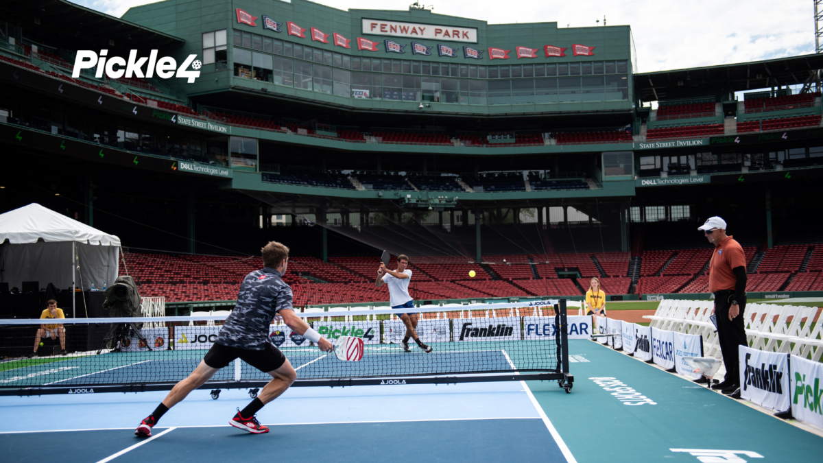 Competitive pickleball players battling in a high-stakes tournament match