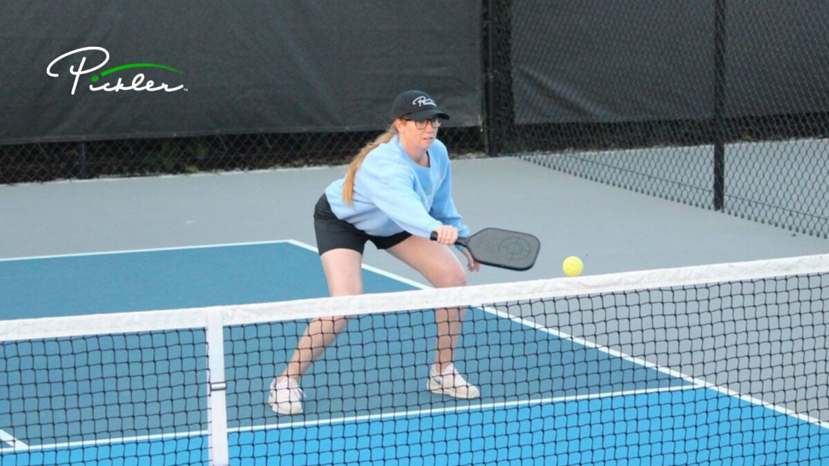 pickleball player dinking and demonstrating patience strategy