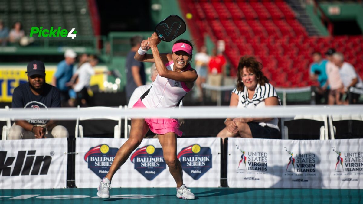 Competitive pickleball players battling in a high-stakes tournament match