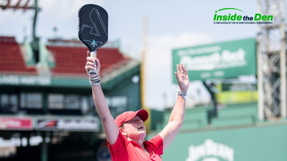 pickleball player celebrating on court, displaying positive mental health and wellbeing