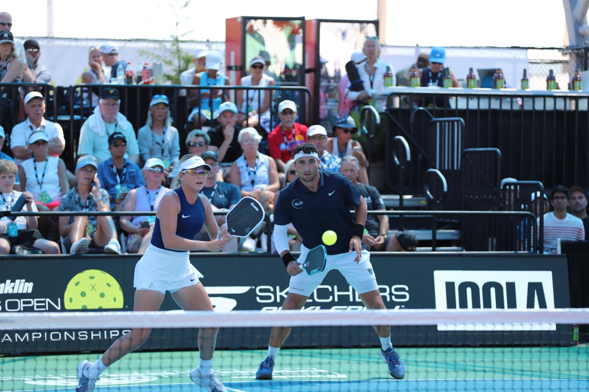 Anna Leigh Waters and Jay Devilliers compete in the mixed pro doubles finals on Championship Court at the 2026 Franklin US Open Pickleball Championships in Naples, Florida