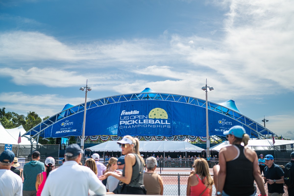 Crowd-filled stands watching pickleball matches on the courts oustide Championship Court during the US Open Pickleball Championships in Naples, Florida
